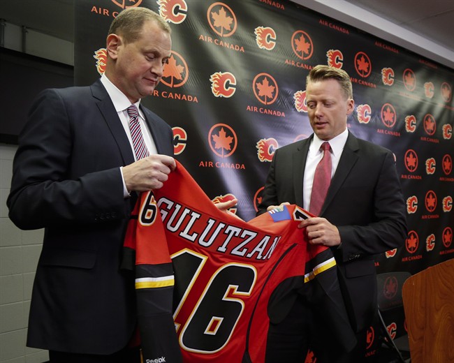 Calgary Flames&#39 general manager Brad Treliving left named Glen Gulutzan as the team's new head coach at a news conference in Calgary Friday