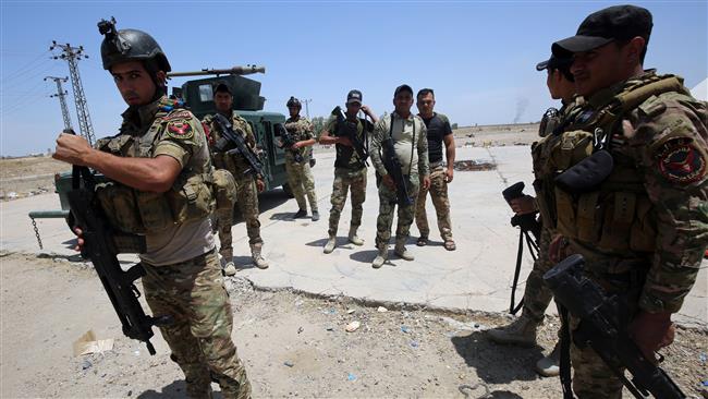 Iraqi security forces gather on the outskirts of Fallujah as they prepare an operation aimed at retaking the city from the Daesh terrorist group