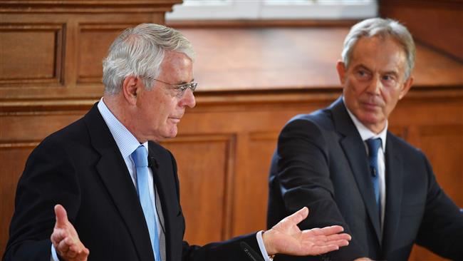 Britain's Conservative former prime minister John Major speaks alongside Labour former prime minister Tony Blair as the two visit the University of Ulster in Derry, Northern Ireland