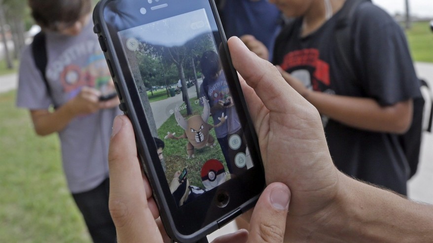 The Latest: How does Pokemon Go work?