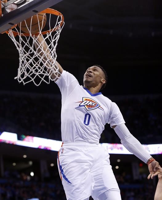 Oklahoma City Thunder guard Russell Westbrook dunks during an NBA basketball game against the Houston Rockets in Oklahoma City. Westbrook is no longer sharing the NBA marquee in Oklahoma City after the Thunde