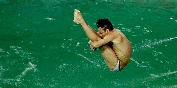 British diver Tom Daley takes part in a training session after the water in the diving pool turned green in the Maria Lenk Aquatic Center