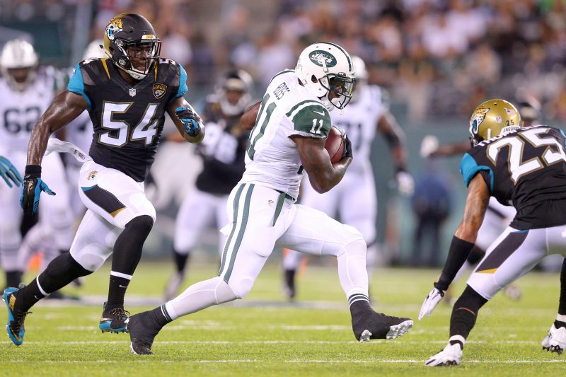 Aug 11 2016 East Rutherford NJ USA New York Jets wide receiver Jeremy Ross runs the ball between Jacksonville Jaguars outside linebacker Joplo Bartu and Jacksonville Jaguars defensive back Peyton Thompson during the third quarter of