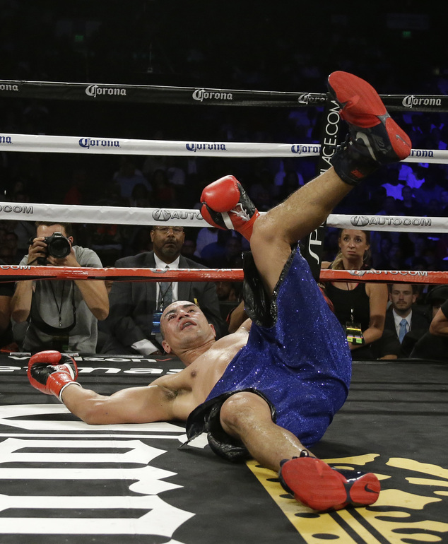 Alexander Brand goes tumbling to the mat during the ninth round of his light heavyweight boxing match against Andre Ward on Saturday Aug. 6 2016 in Oaklan