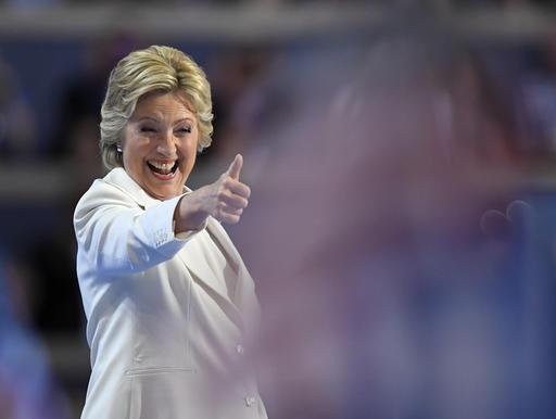 Democratic presidential nominee Hillary Clinton give a thumbs up after taking the stage to make her acceptance speech during the final day of the Democratic National Convention in Philadelphia on Thursday