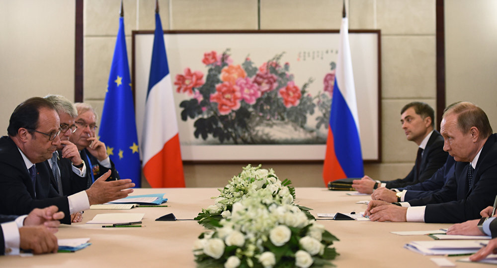 French President Francois Hollande meets with Russian President Vladimir Putin during the G20 Leaders Summit in Hangzhou in China's eastern Zhejiang province