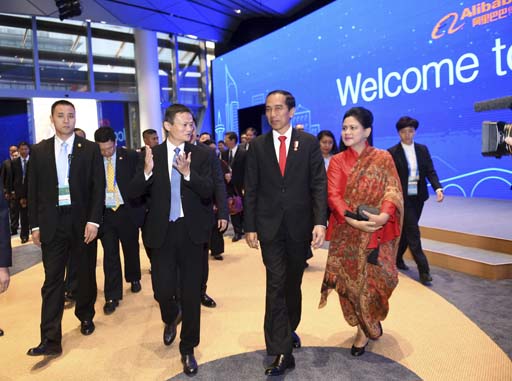 News Agency Jack Ma center left founder of China's e-commerce giant Alibaba introduces the enterprise to visiting Indonesian President Joko Widodo at the headquarters of Alibaba Group in Yuhang District of Hangzhou