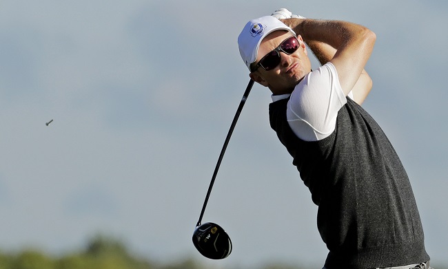 Team Europe's Justin Rose hits a drive on the third hole during a practice round for the Ryder Cup golf tournament Thursday Sept. 29 2016 at Hazeltine National Golf Club in Chaska Minnesota. Rose lost $100 after a heckler successfully sank a