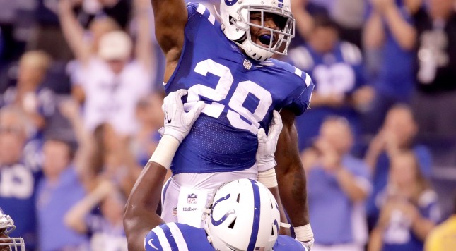 INDIANAPOLIS IN- SEPTEMBER 25 Mike Adams #29 and Zach Kerr #94 of the Indianapolis Colts celebrate after Adams recovered a fumble late in the fourth quarter of the Colts 26-22 win over the San Diego Chargers at Lucas Oil Stadium