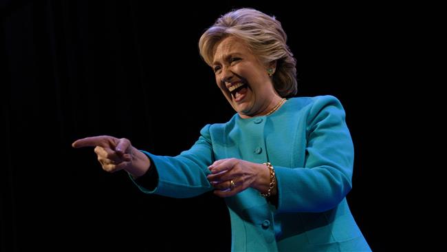 Democratic presidential nominee Hillary Clinton greets supporters as she leaves after speaking at a fundraiser at the Paramount Theater