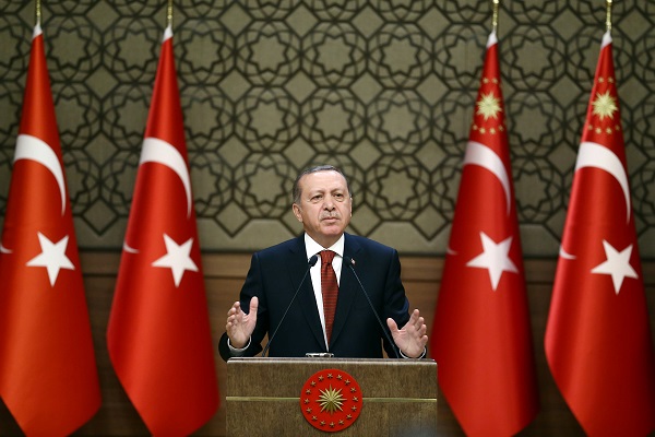 Turkish President Tayyip Erdogan makes a speech during his meeting with mukhtars at the Presidential Palace in Ankara Turkey