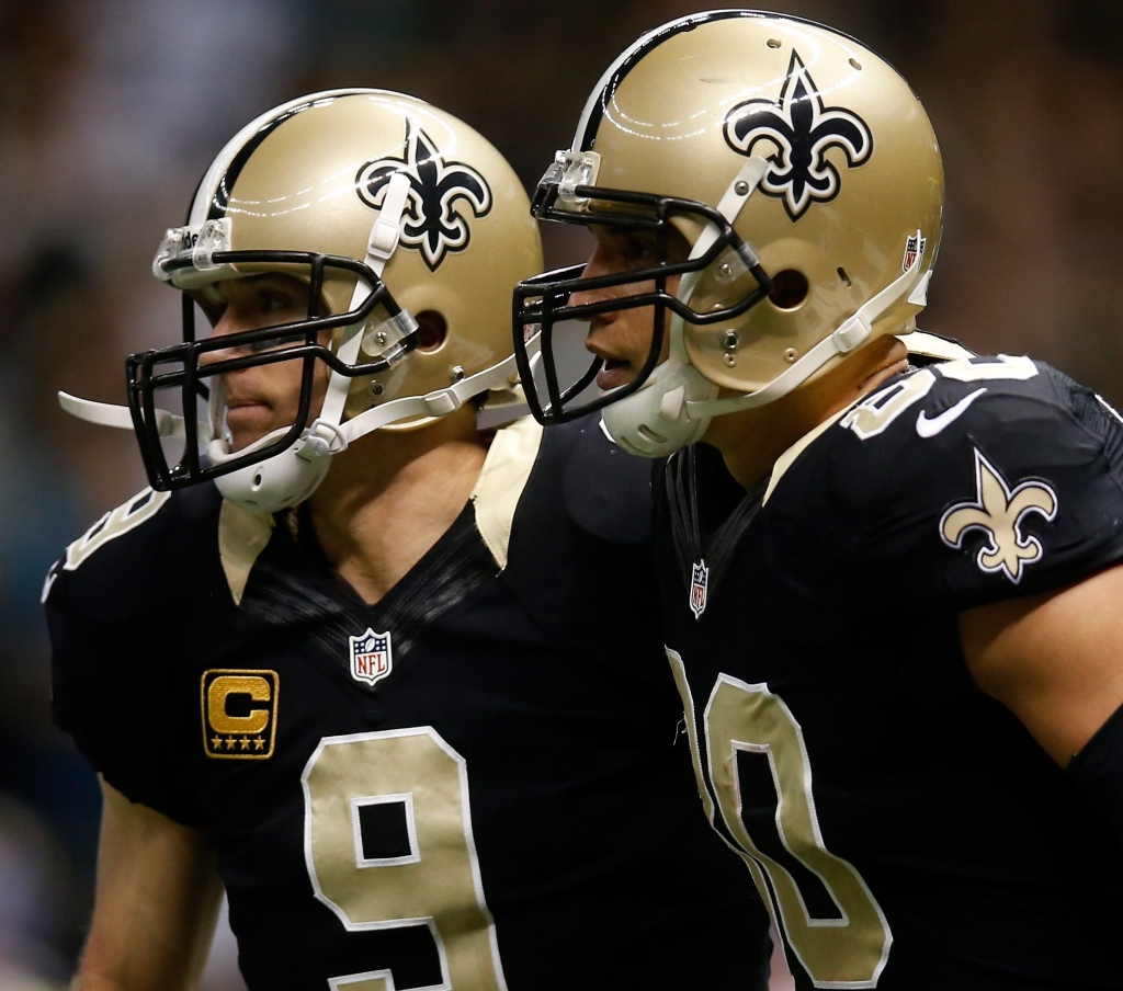 NEW ORLEANS LA- DECEMBER 08 Drew Brees #9 and Jimmy Graham #80 of the New Orleans Saints celebrate after a touchdown against the Carolina Panthersat Mercedes Benz Superdome