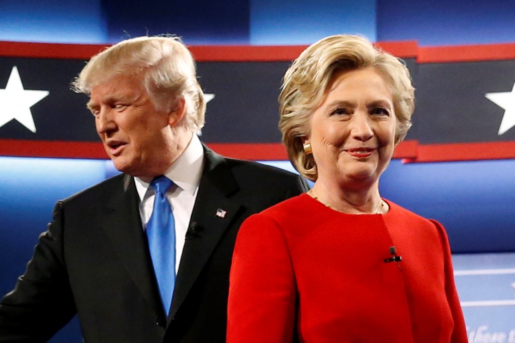 Trump and Clinton greet one another as they take the stage for their first debate at Hofstra University in Hempstead New York U.S