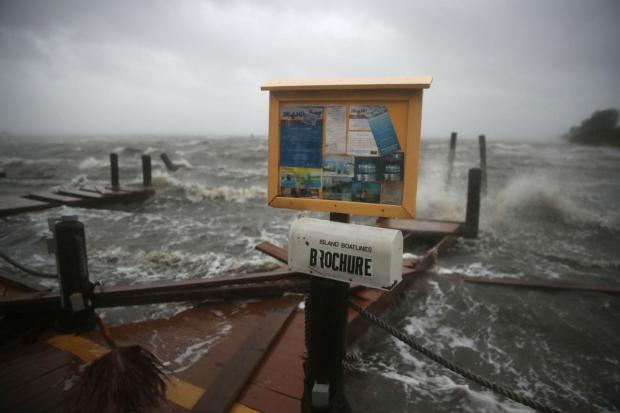 Hurricane Matthew Weakens To A Category 3 As Storm Pummels Florida Coast