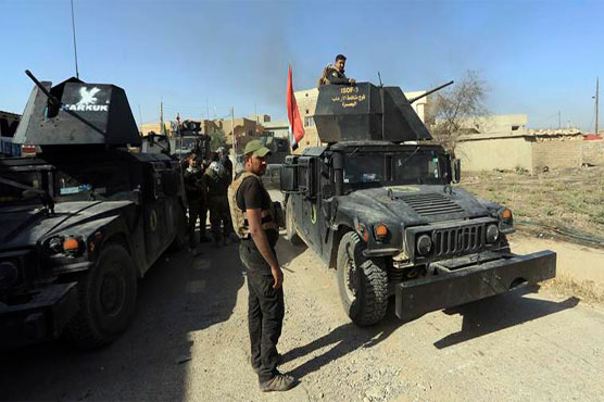 Iraqi forces battled through sniper fire and suicide car bombs to tighten the noose around Mosul