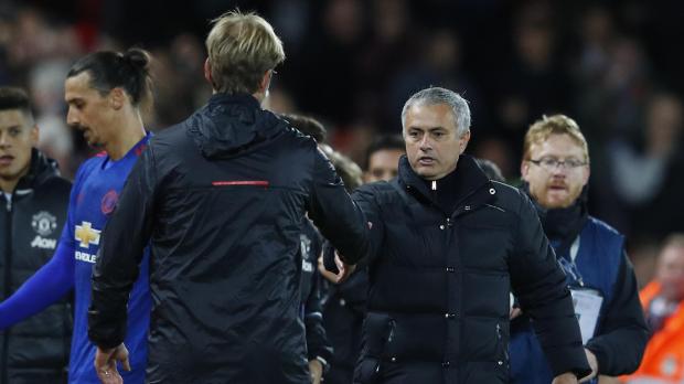 Liverpool manager Juergen Klopp and Manchester United manager Jose Mourinho at the end of the match