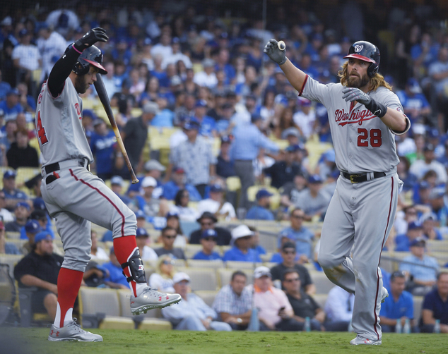 Washington Nationals Jayson Werth left celebrates after his home run with Bryce Harper during the ninth inning in Game 3 of baseball's National League Div