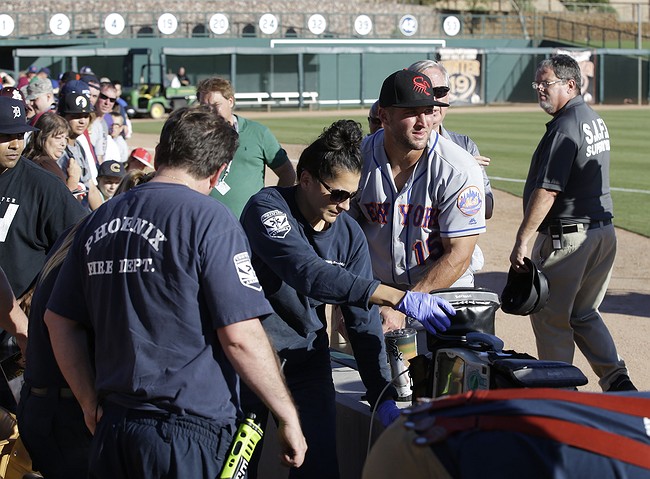 Tim Tebow helps save fan who had seizure