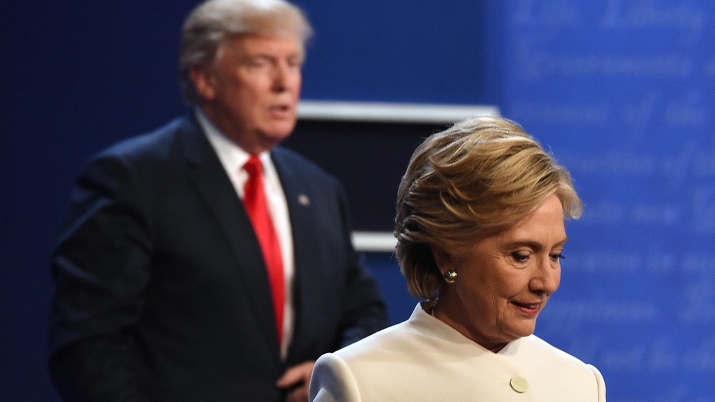 Hillary Clinton and Donald Trump walk off stage Wednesday after the third and final presidential debate at the University of Las Vegas in Las Vegas Nev