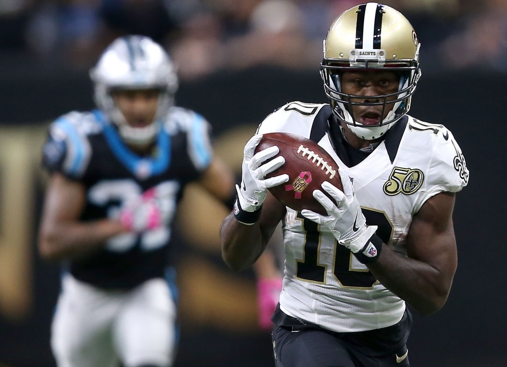 NEW ORLEANS LA- OCTOBER 16 Brandin Cooks #10 of the New Orleans Saints catches the ball for a first down against the Carolina Panthers during the fourth quarter at the Mercedes Benz Superdome