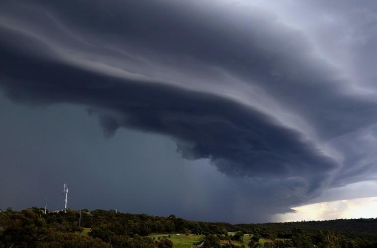 A large storm front crosses over the Sydney suburb of Wakehurst