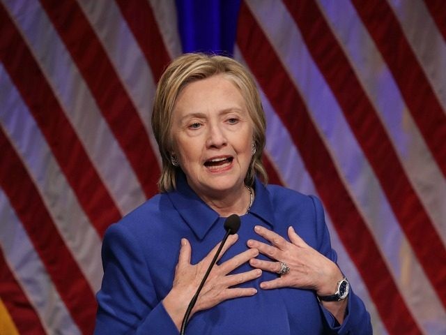 Former Secretary of State Hillary Clinton delivers remarks while being honored during the Children's Defense Fund's Beat the Odds Celebration at the Newseum