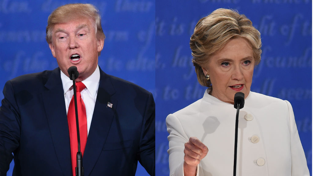 LAS VEGAS NV- OCTOBER 19 Republican presidential nominee Donald Trump speaks as Democratic presidential nominee former Secretary of State Hillary Clinton looks on during the third U.S. presidential debate at the Thomas & Mack Center on October 19