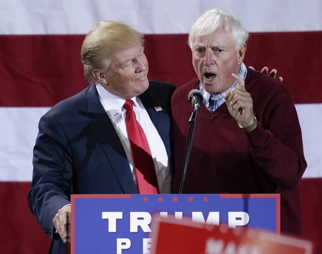 Republican presidential candidate Donald Trump is endorsed by former coach Bobby Knight during a campaign rally in Grand Rapids Mich. Monday Oct. 31 2016