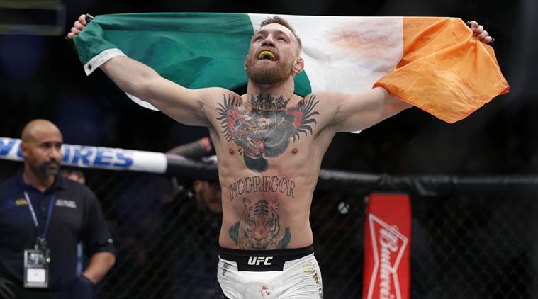 Conor McGregor McGregor Triple H Conor Mc Gregor WWE Mc Gregor UFC UFC WWE news WWE UFC wrestlers WWE UFC athletes sports sports news