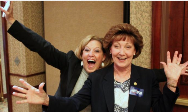 Republican Senator Vicki Schmidt left and Republican Rep.-elect Brenda Dietrich celebrate their victories in Tuesday’s election at a party in Topeka