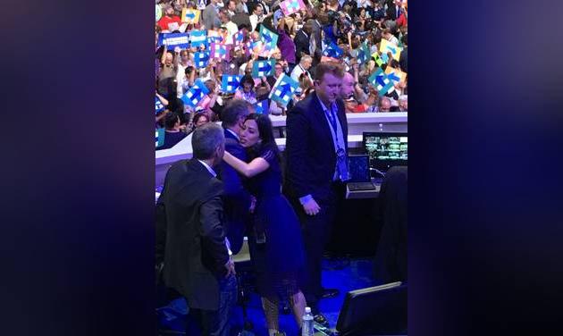 Huma Abedin Vice Chair of the Clinton Presidential Campaign celebrates moments after Clinton is pronounced the Democratic nominee. Abedin is seen hugging and celebrating with other Clinton aides on the stage at the Democratic National Convention