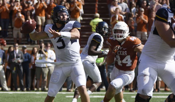 Nov 12 2016 Austin TX USA West Virginia Mountaineers quarterback Skyler Howard looks to pass against the Texas Longhorns during the second quarter at Darrell K Royal Texas Memorial Stadium