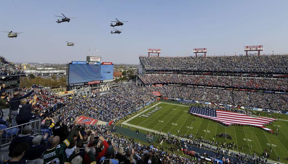 The Latest Titans try onside kick to start game vs Packers