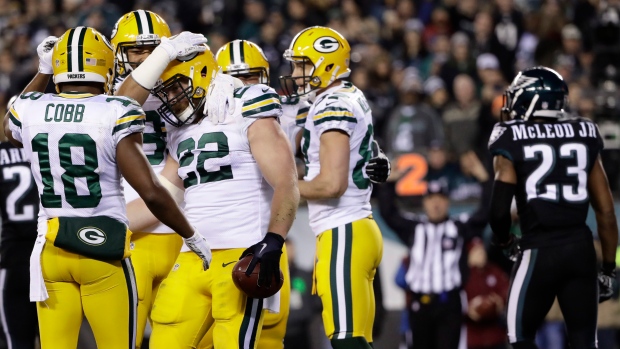 Green Bay Packers&#39 Aaron Ripkowski celebrates with teammates after scoring a touchdown against the Philadelphia Eagles in the second half