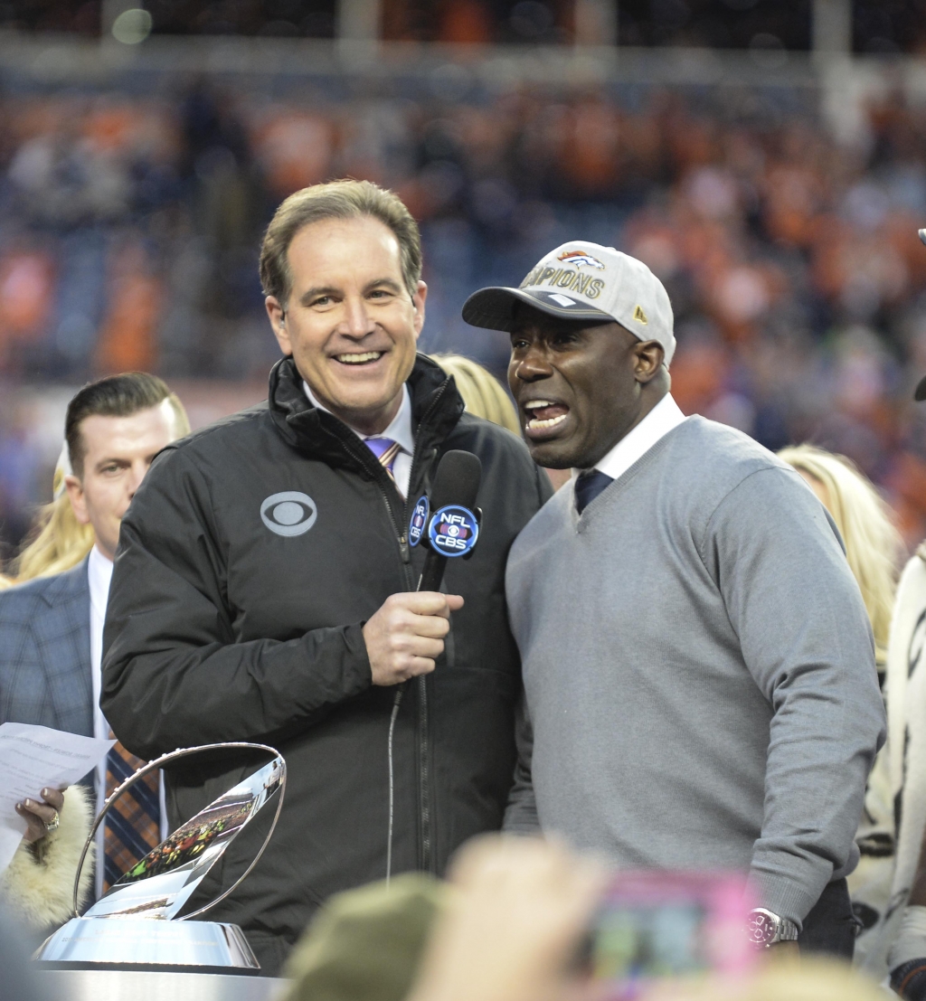 Jan 24 2016 Denver CO USA Jim Nantz interviews former Broncos running back Terrell Davis after the AFC Championship football game at Sports Authority Field at Mile High. Denver Broncos defeated New England Patriots 20-18 to earn a trip to Super Bowl