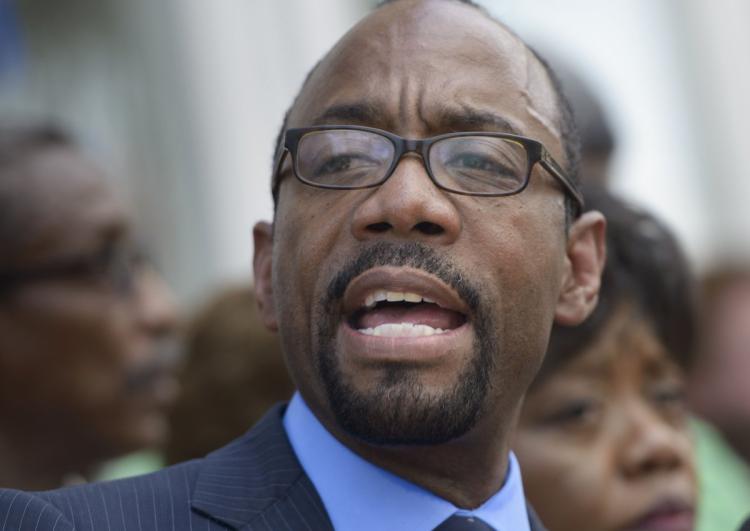 NAACP head Cornell Williams Brooks said the election was'clouded by voter suppression' pointing to a'voter purge in North Carolina that a federal judge had to intervene to stop