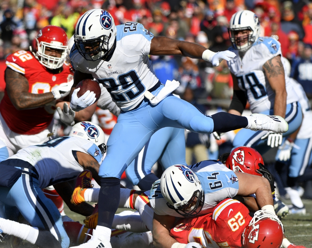 Tennessee Titans running back De Marco Murray vaults Kansas City Chiefs defensive back Eric Berry who is blocked by offensive guard Josh Kline during the first half of an NFL football game in Kansas City Mo. Sunday Dec. 18 2016. (AP Phot