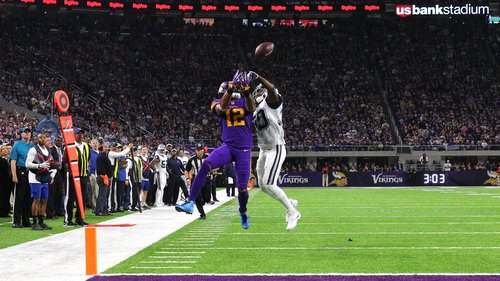 Anthony Brown of the Dallas Cowboys breaks up a pass to Charles Johnson of the Minnesota Vikings