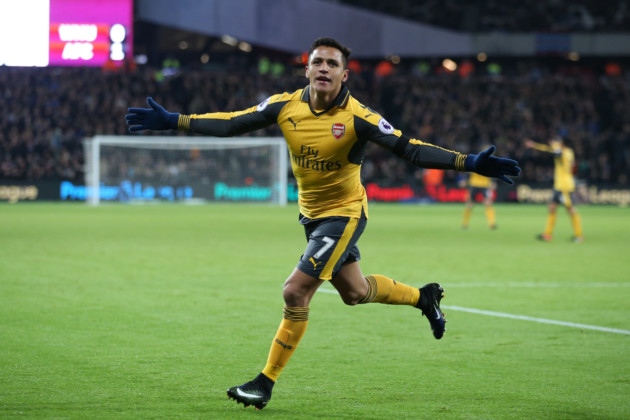 Arsenal's Alexis Sanchez celebrates scoring his side's second goal of the game during the Premier League match at the London Stadium