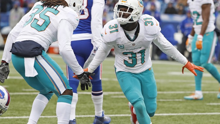 Dolphins earn 1st playoff berth since 2008 with Denver loss