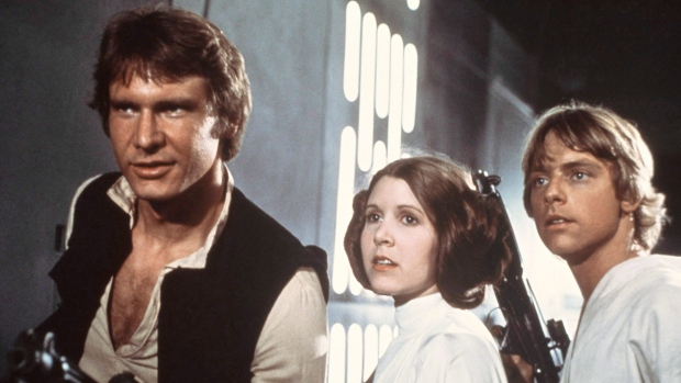 Harrison Ford Carrie Fisher and Mark Hamill are shown in a scene from'Star Wars