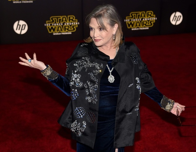 TMZ: Carrie Fisher suffers heart attack on flight, rushed to hospital