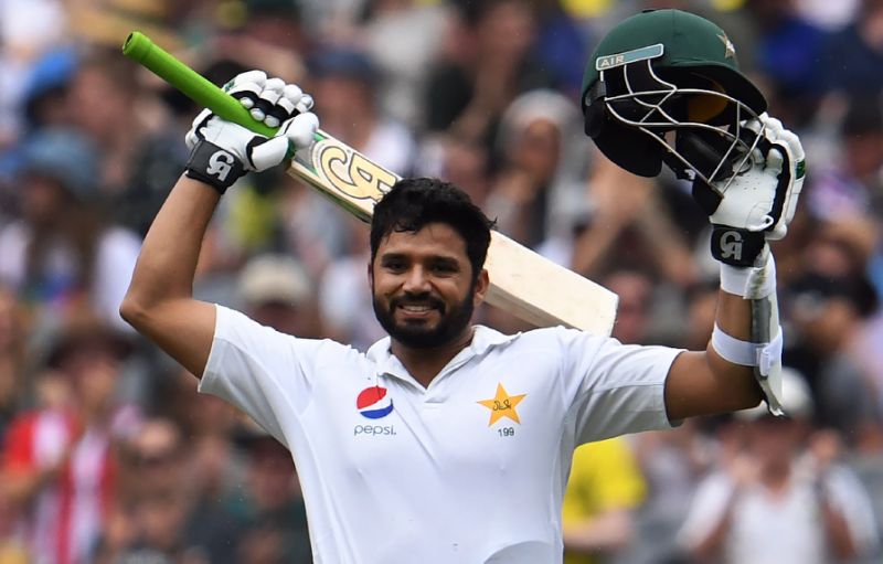 Pakistan's batsman Azhar Ali celebrates after scoring his century against Australia on the second day of their second Test match in Melbourne