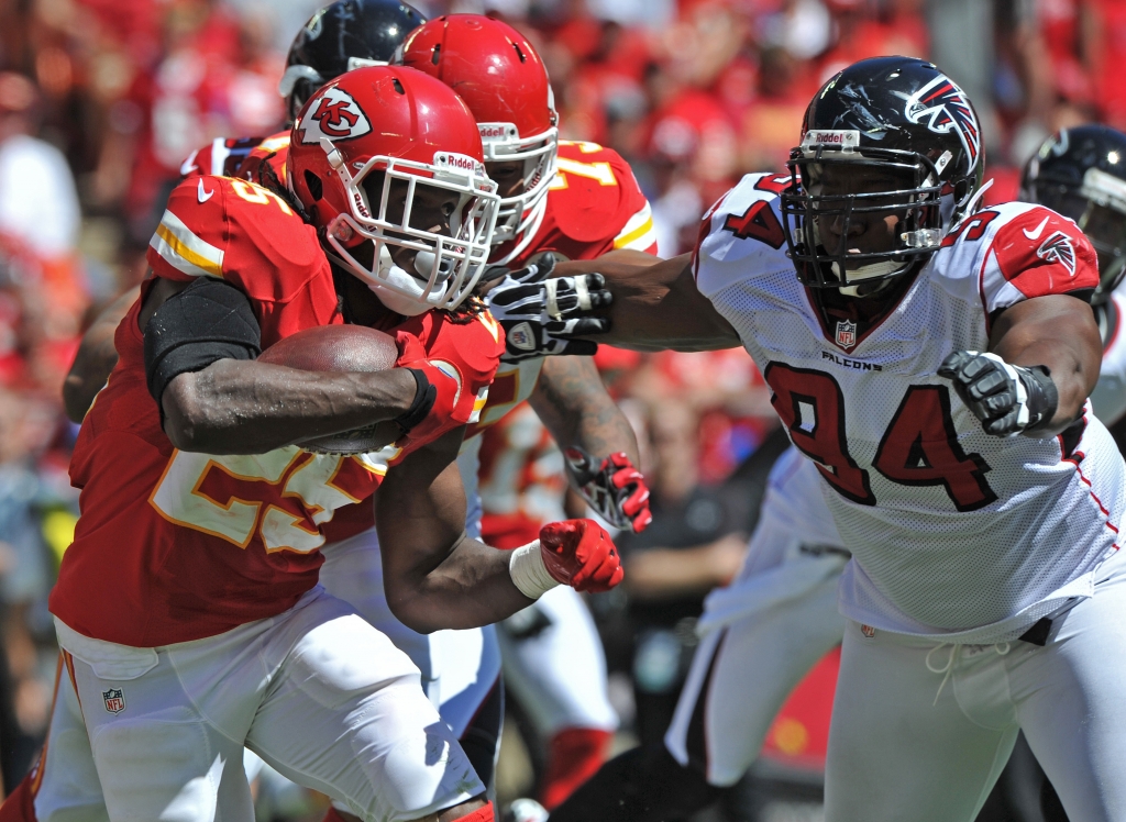 KANSAS CITY MO- SEPTEMBER 9 Running back Jamaal Charles #25 of the Kansas City Chiefs rushes around pressure from the Atlanta Falcons Peria Jerry #94 during the fourth quarter season opener