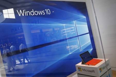 A display for the Windows 10 operating system is seen in a store window at the Microsoft store at Roosevelt Field in Garden City   Thomson Reuters