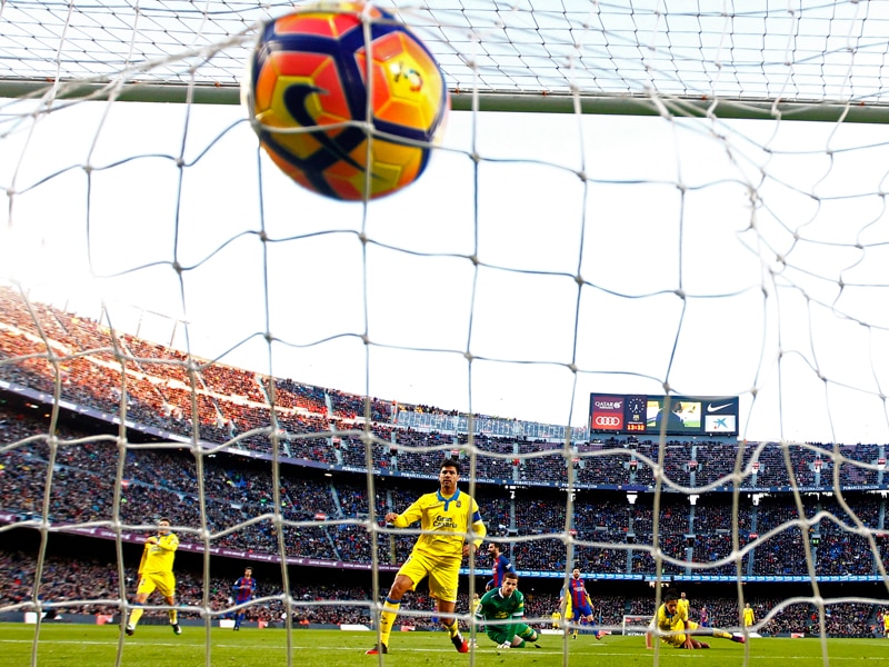 Barcelona have beaten Las Palmas 5-0 at the Camp Nou to move within two points of Real Madrid