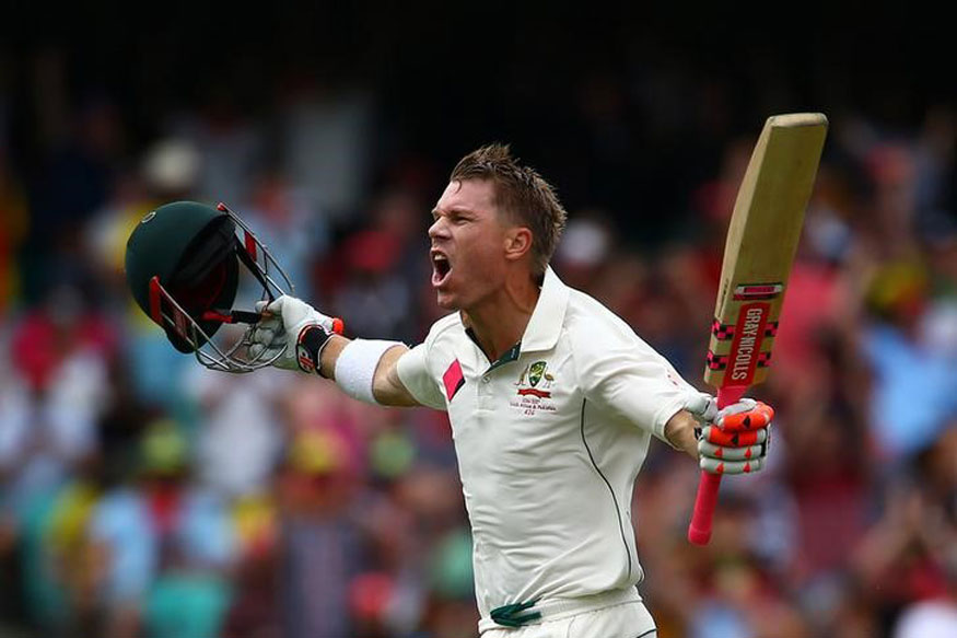 David Warner reacts after completing his century on Day 1 of the third Test against Pakistan at Sydney