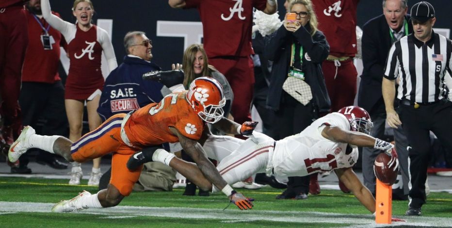 Alabama's Kenyan Drake gets past Clemson's T.J. Green as he runs back a kick off for a touchdown during the second half of the NCAA college football playoff championship game in Glendale Ariz. A year ago A