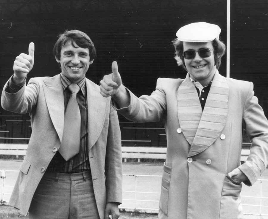 Posing with Elton John shortly after being appointed Watford boss in 1977