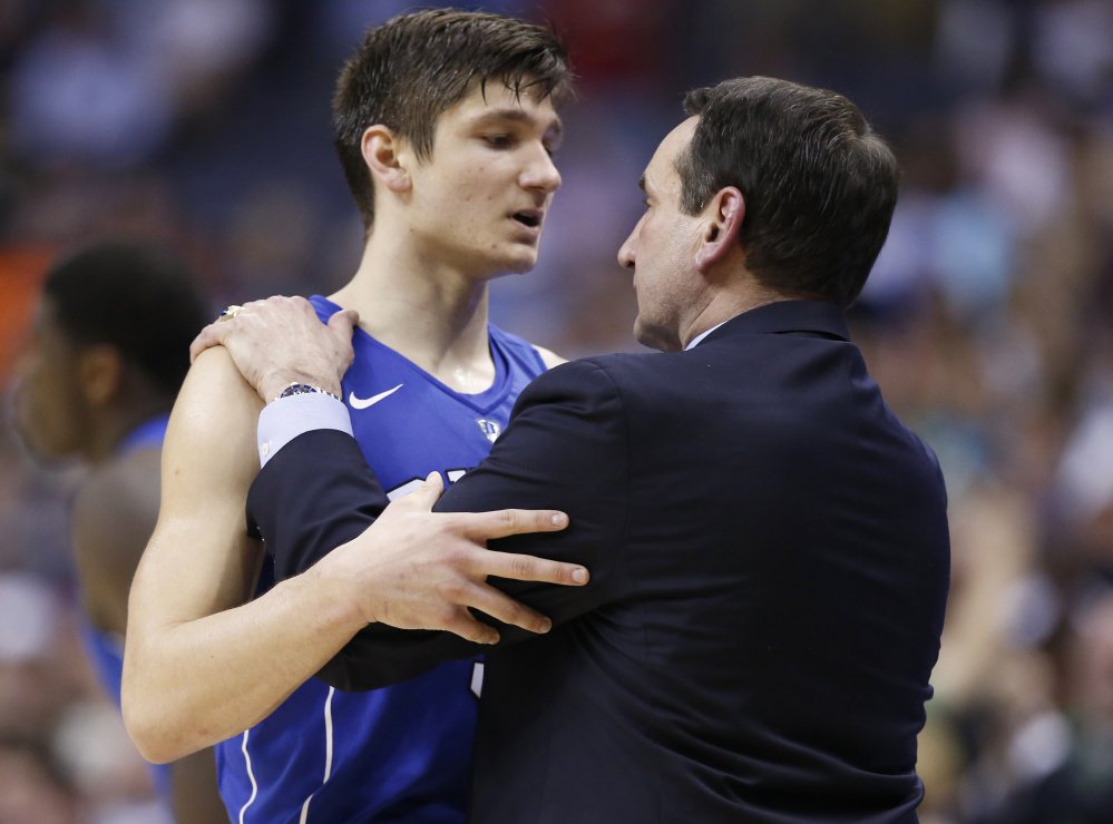 Duke guard Grayson Allen left received just a one-game suspension from his coach Mike Krzyzewski right who is about to depart the team to undergo back surgery leaving much unsettled for the eighth-ranked Blue Devils